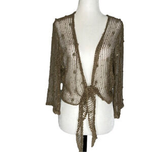 Pretty woman sequinned crocheted shawl